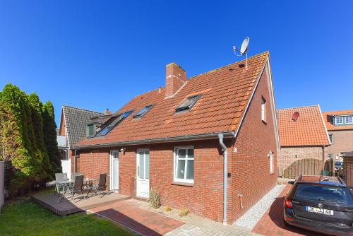 Ferienwohnungen im Haus Meeresleuchten — 4-Star Luxury Hotel in Neuharlingersiel, Germany