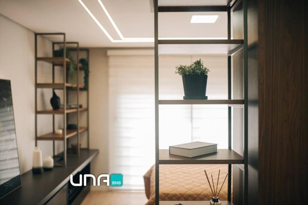 Loft com sacada lareira e garagem no Parque Una — 4-Star Luxury Hotel in Pelotas, Brasil