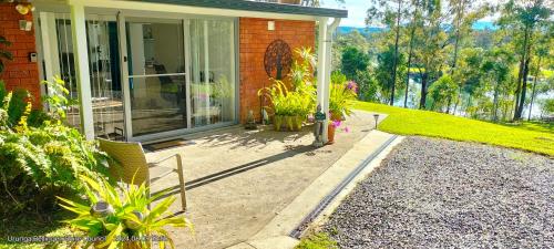 The Glade peace among the trees on the river — hotel in Urunga