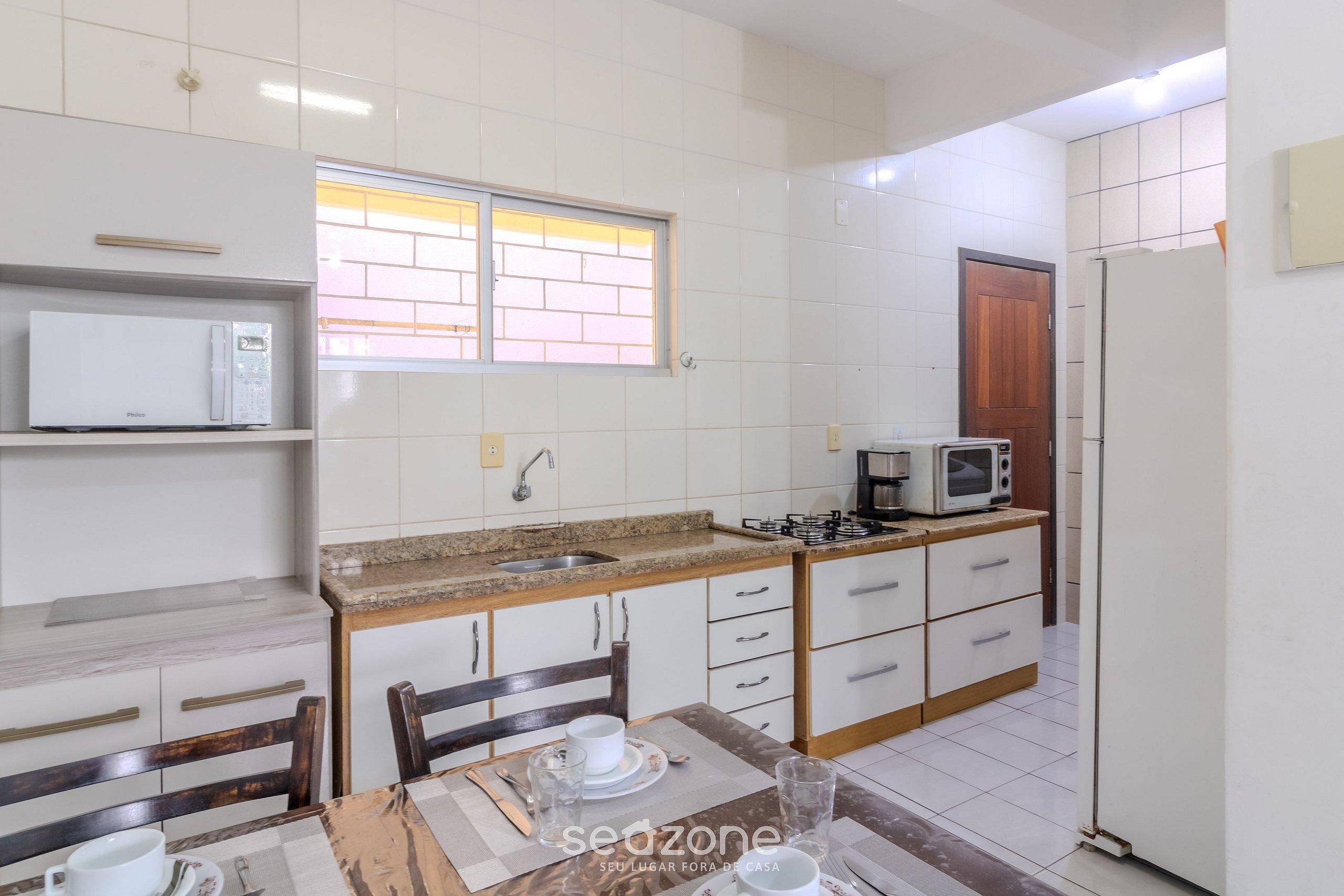 Casa 600m da Praia Central c garagem 3 qts NRR128