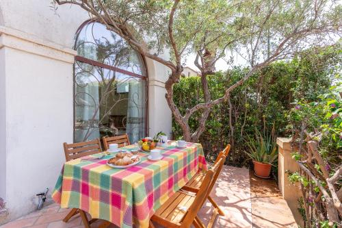 Appartamento Elga — 4-Star Luxury Hotel in Villasimius, Italy