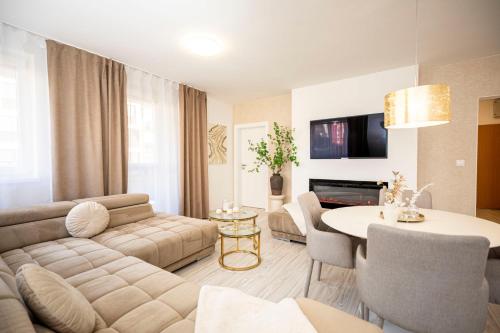 ALURE RESIDENCES 13 & 24h self check in fireplace private parking in front of the apartment building included new building green area with meadows and forests — 4-Star Luxury Hotel in Banska Bystrica, Slovakia