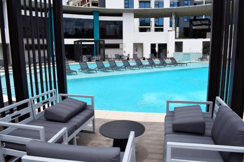 Apartamento con piscina y espacio de trabajo — 4-Star Luxury Hotel in San Jose, Costa Rica