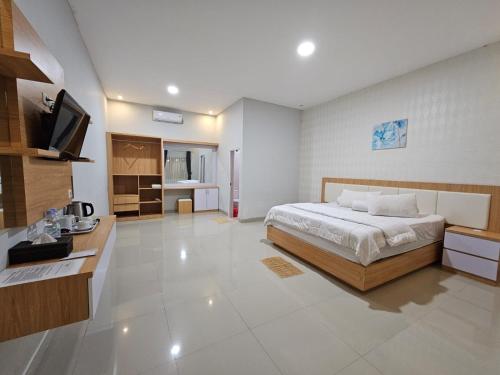 Losmen 88 - carbon neutral hotel in Tentena