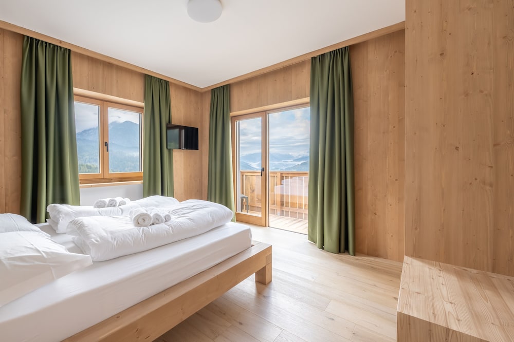 Ama Dolomiti Residence 19242385 — Vigo Di Cadore