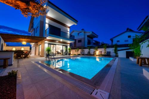 Casa Oliva City 1 with Sauna Pool Patio & BBQ — 4-Star Luxury Hotel in Fethiye, Turkey