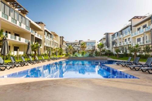 Apartment in Dar Bouazza with Pool Gym & Kids Playground — 4-Star Luxury Hotel in Dar Bouazza, Morocco
