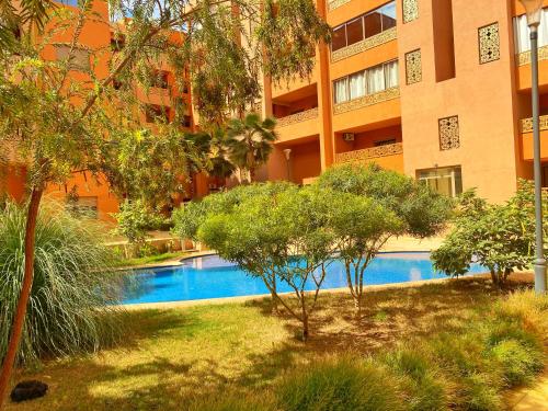 Superbe appartement en résidence avec piscines — 4-Star Luxury Hotel in Marrakesh, Morocco