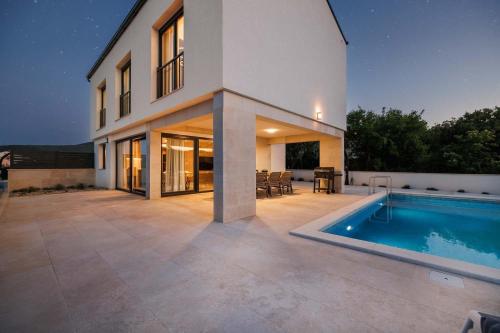 Holiday house with a swimming pool Vrbnik Krk 24526 — 4-Star Luxury Hotel in Vrbnik, Croatia