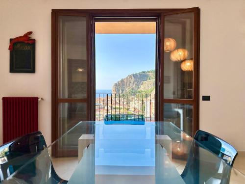 Flight over the sea House by Housilia — 4-Star Luxury Hotel in Cefalu, Italy