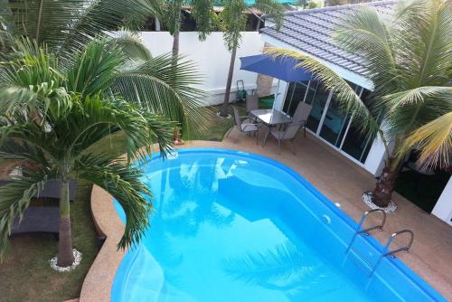 Coconut Palms — 4-Star Luxury Hotel in Kantharawichai, Thailand