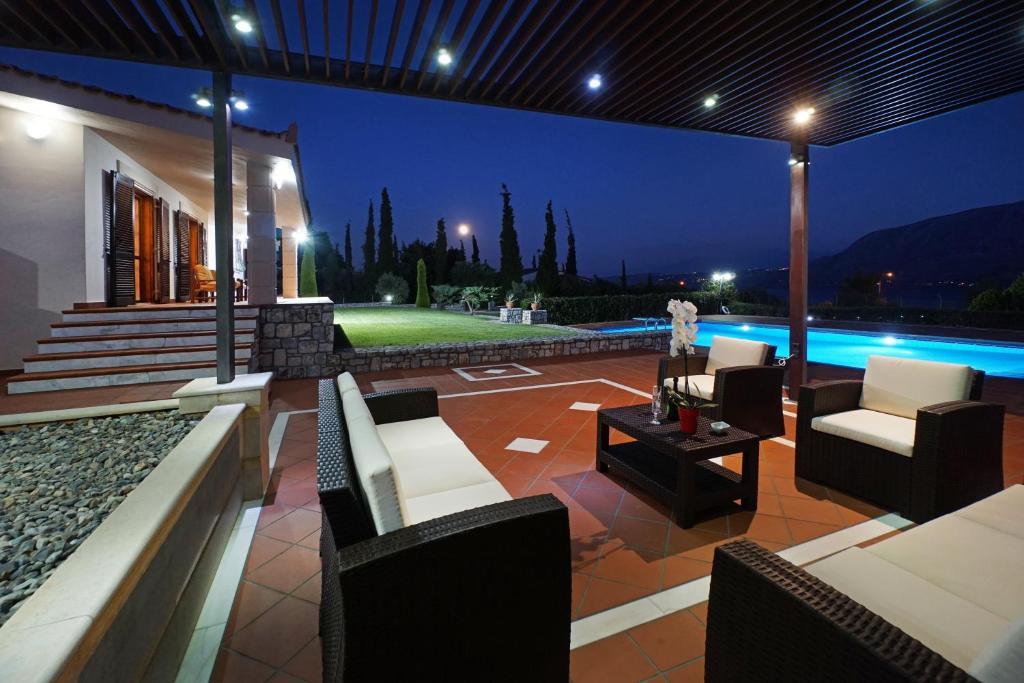 Villa Thealassa Hanging Over the Sea by etouri — 4-Star Luxury Hotel in Souda, Greece