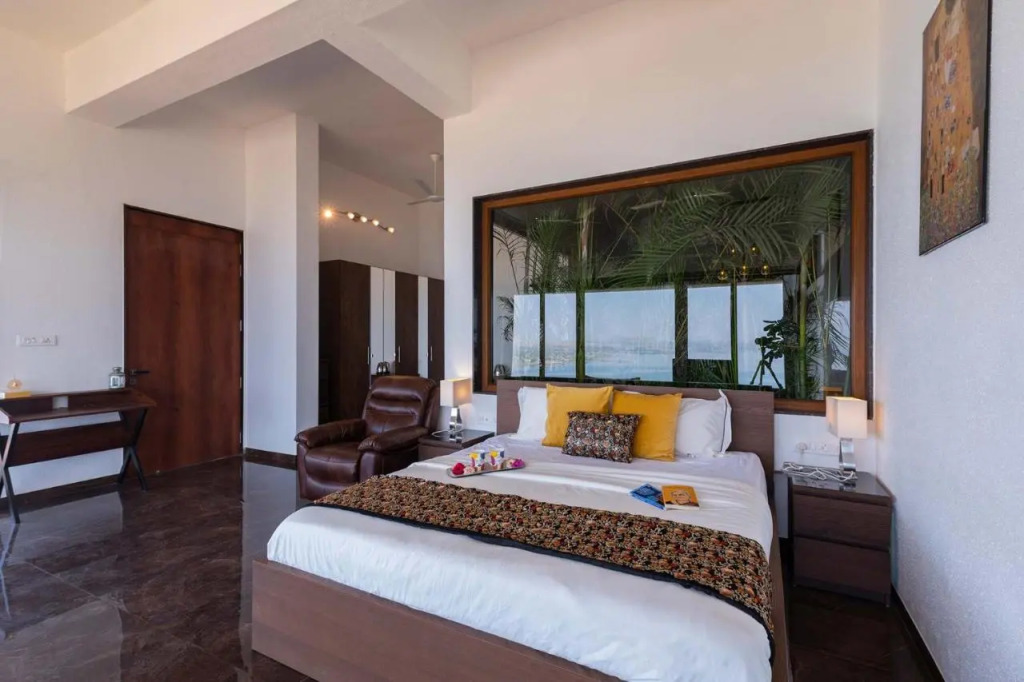 StayVista at Sunset on the Lake Infinity Lakeview Swimming Pool with Contemporary Interiors & Lavish Amenities
