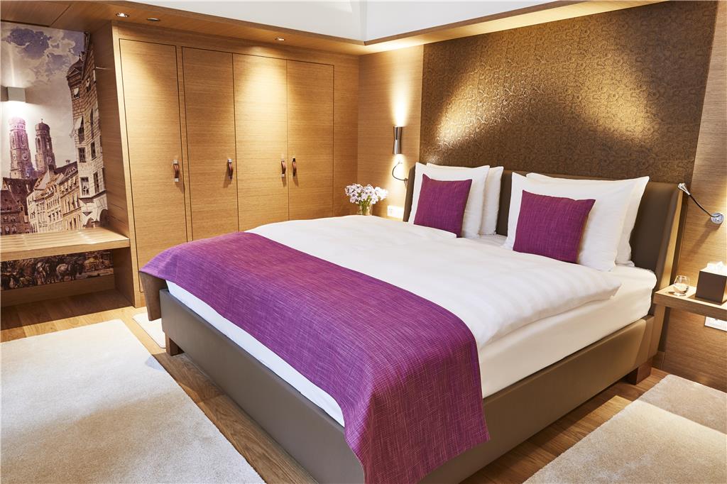 MUC1_Superior Suite bedroom.jpg