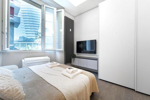 Designed apartment in Milan center Gae Aulenti area with AC WiFi and Subway airport connected steps from Central Station — 4-Star Luxury Hotel in Milan, Italy