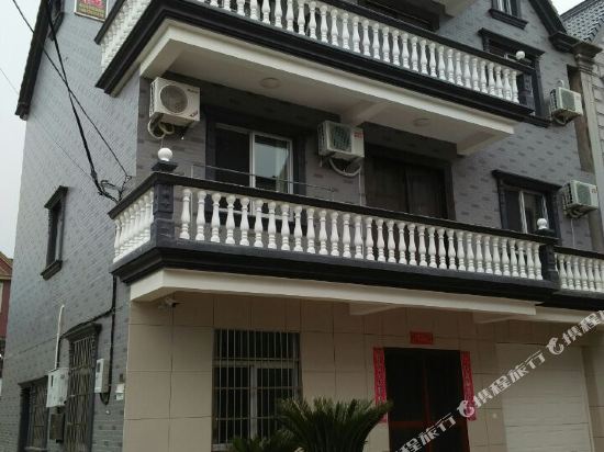 Xinlai Inn - carbon neutral hotel in Menghai