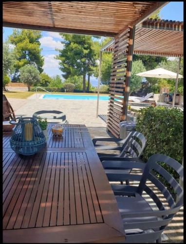 Villa Terrina — 4-Star Luxury Hotel in Ayioi Apostoloi, Greece