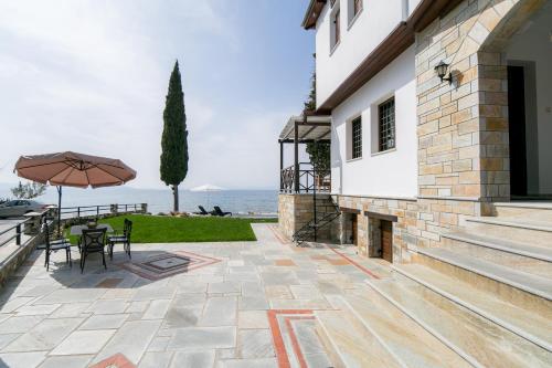 Mermaid Beachfront Villa — 4-Star Luxury Hotel in Koropi, Greece