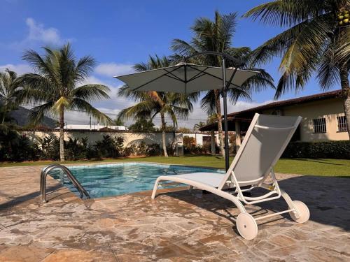 Refugio Tropical Com Piscina Fantastica No Centro Da Cidade Em Caraguatatuba in Caraguatatuba, Brasil