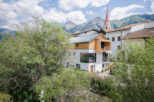 Chalet Ortles M — 4-Star Luxury Hotel in Curon Venosta, Italy