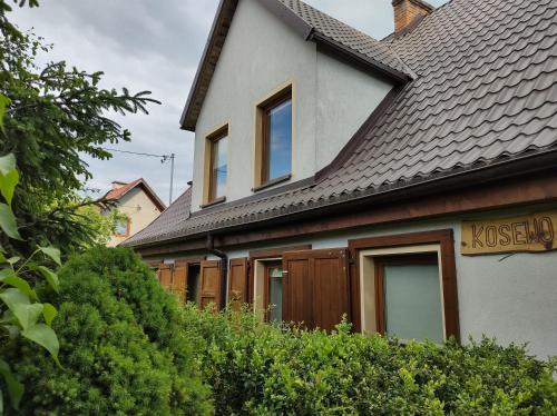 Dom Goscinny Pod Debem in Mragowo, Poland