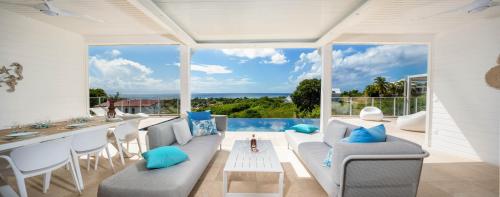 Villa Olina vue mer jardin piscine — 4-Star Luxury Hotel in Grand-Bourg, Guadeloupe