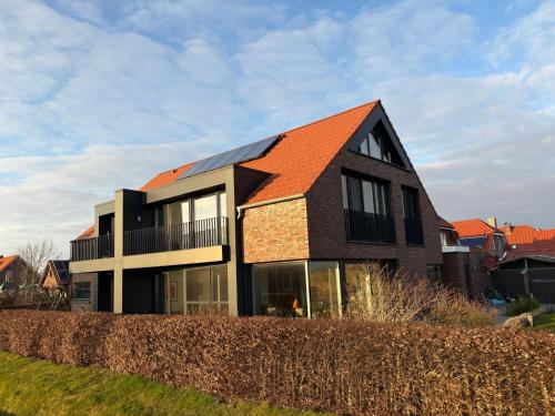 Großzügiges modernes Ferienhaus in Neuharlingersiel, Germany