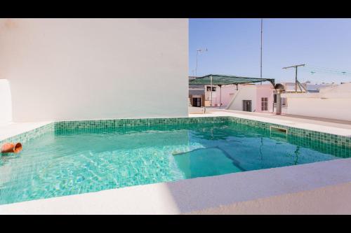 Stunning House With Rooftop and Pool by LovelyStay — 4-Star Luxury Hotel in Fuzeta, Portugal