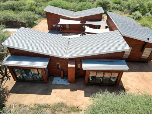 Emintha Log House — 4-Star Luxury Hotel in Thabazimbi, South Africa