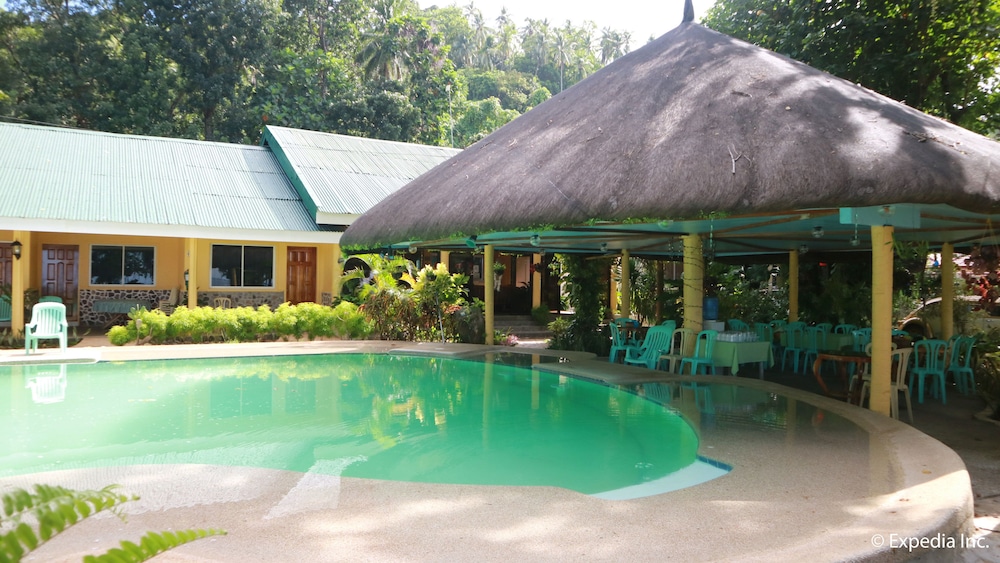 Golden Sunset Beach Club in Mambajao, Philippines