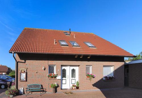 Ferienwohnungen im Haus Herrmann — 4-Star Luxury Hotel in Neuharlingersiel, Germany