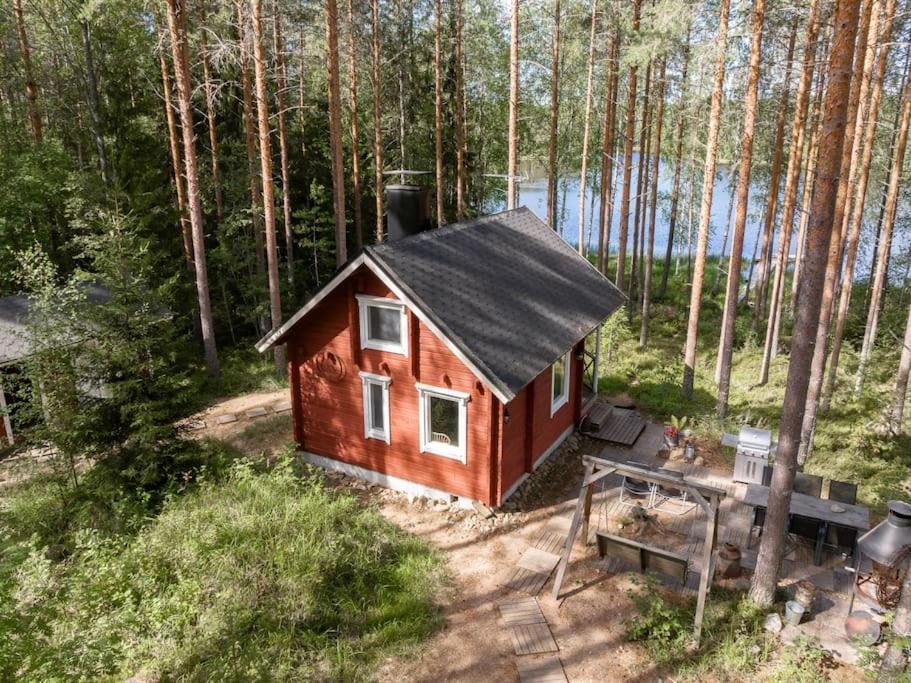 Traditional cottage with hot tub — 4-Star Luxury Hotel in Uurainen, Finland
