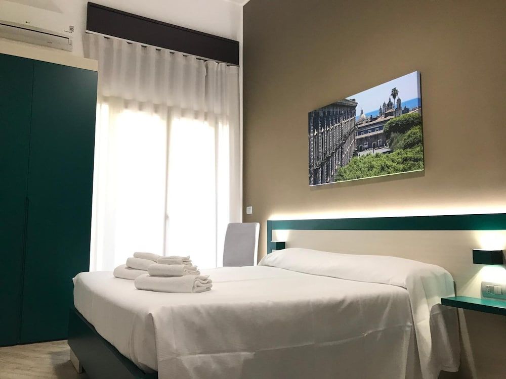 Guesthouse Ughetti 21 — 4-Star Luxury Hotel in Catania, Italy