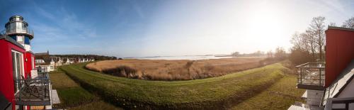 Deichhaus Brisinga — 4-Star Luxury Hotel in Wiek, Germany
