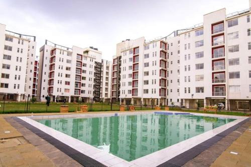 Delightful Studio Racecourse Gardens Apt with pool