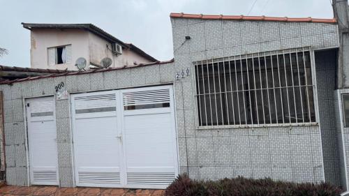 Pousada Flores do Campo Ita in Itanhaem, Brasil