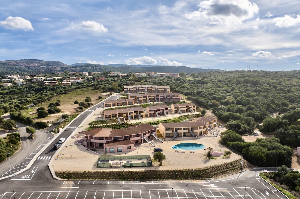 Residence with pool in Isola Rossa — 4-Star Luxury Hotel in Piscinas, Italy