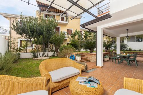 La Casa sulla Piazza con giardino — 4-Star Luxury Hotel in Santa Maria Navarrese, Italy