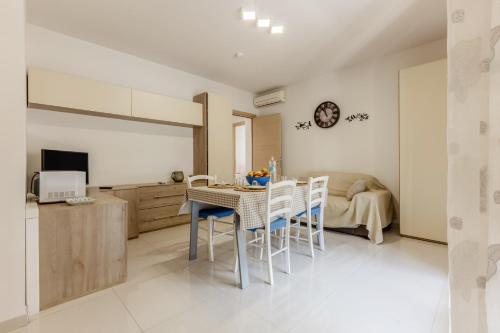 GuestHost Bright Apartment X4 with Terrace — 4-Star Luxury Hotel in Cagliari, Italy