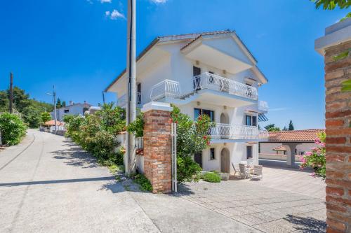 Seaside apartments with a swimming pool Omisalj Krk 24362 — 4-Star Luxury Hotel in Omisalj, Croatia