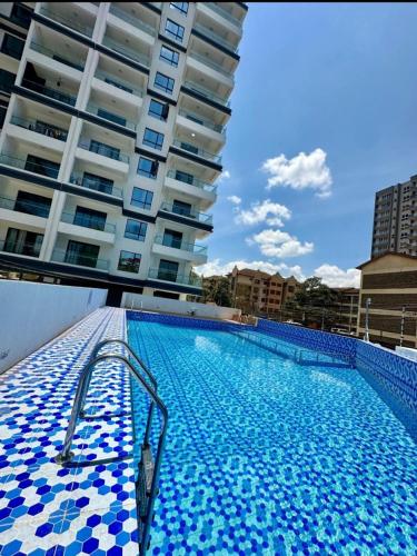Executive living three bedroom apartment with fully equipped gym swimming pool children playing ground and amazing scenic city views