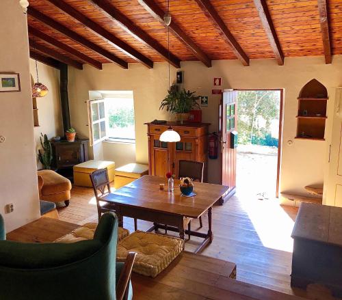 Casa Anneli relaxing under the olive tree — 4-Star Luxury Hotel in Aljezur, Portugal