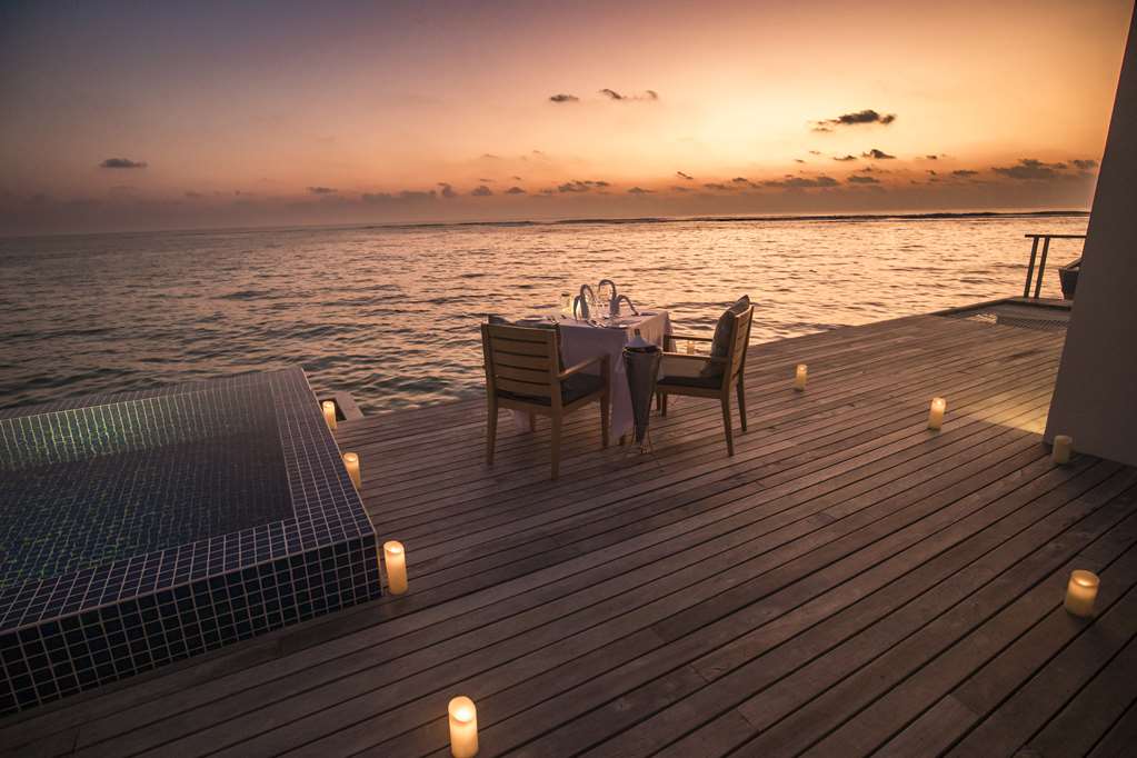 Dining by design overwater villa dinner
