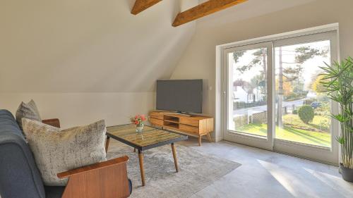 Kapitänshaus Brücke — 4-Star Luxury Hotel in Born, Germany