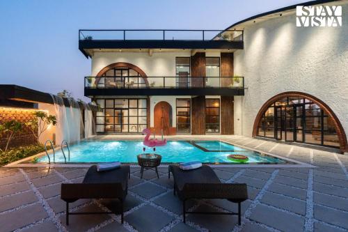 StayVista at Whispering Arc with Private Pool & Free Breakfast in Ramnagar, India