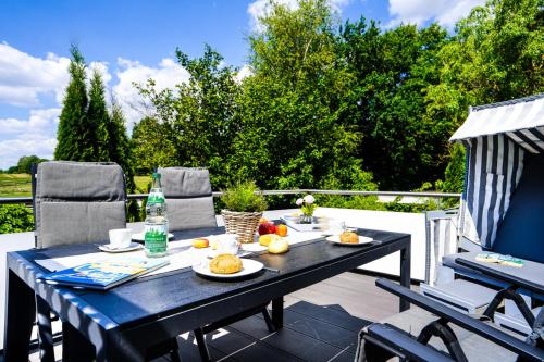 Ferienhaus Auszeit Wohnung Meeresbrise — 4-Star Luxury Hotel in Gromitz, Germany