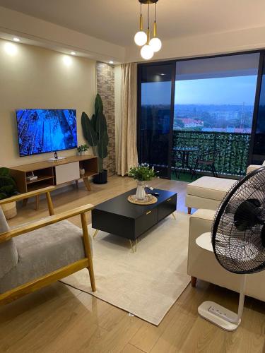 Beautifully Furnished Two Bedroom Apartment With Fully Equipped Gym Heated Swimming Pool Ample Parking Space And Amazing Scenic City Views And Children Playing Ground