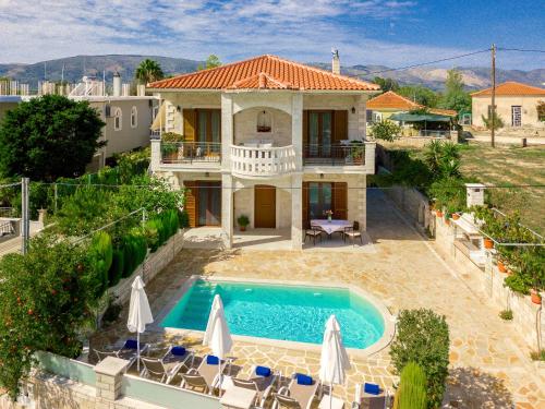 Stone Villa Lika — 4-Star Luxury Hotel in Ambelokipoi, Greece