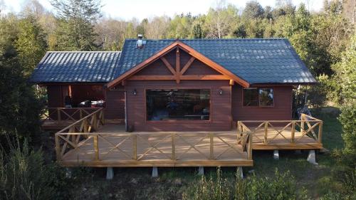 Cabaña Caburgua vista al Volcán Senderos del Bosque in Pucon, Chile
