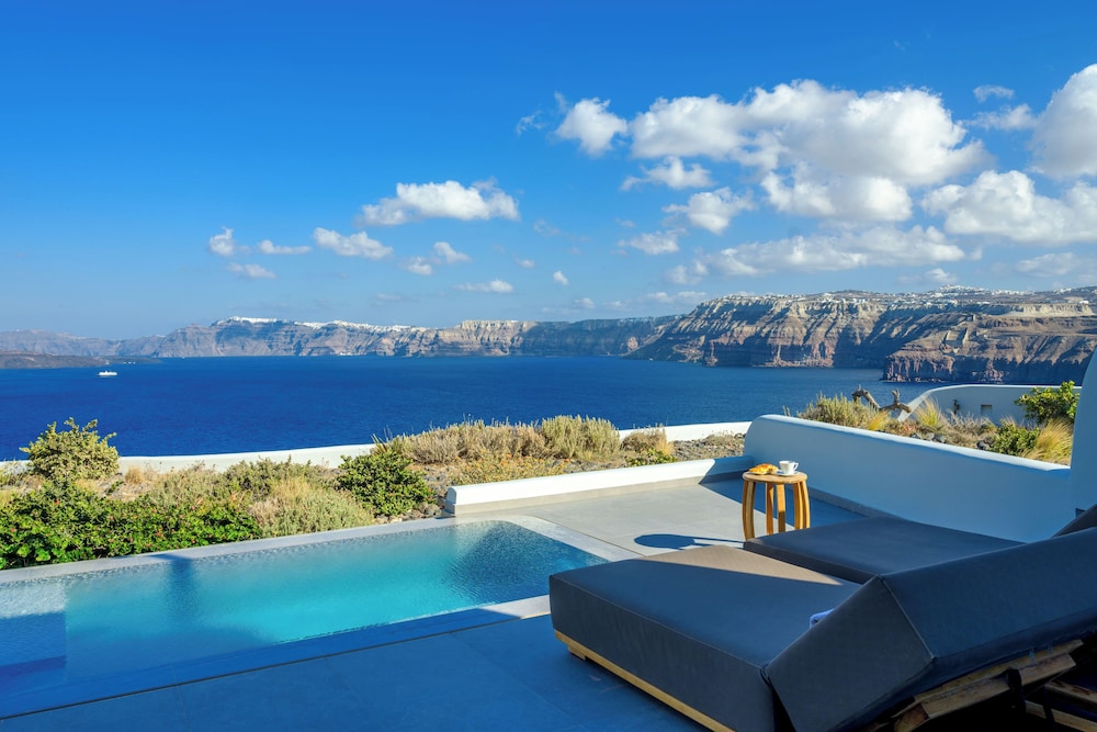 Neptune Luxury Spa Suites — 4-Star Luxury Hotel in Fira, Greece